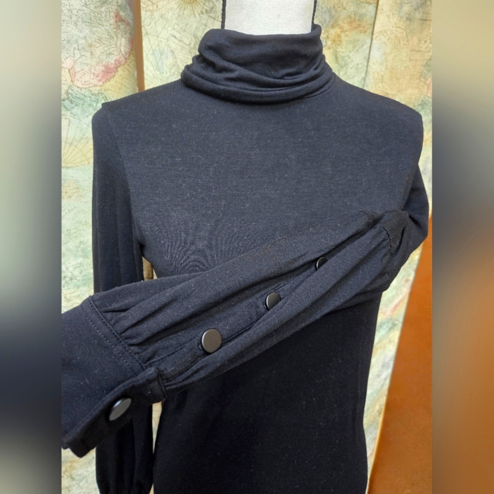 Euc stretchy black turtle neck top w button flounce sleeve. Sz S. Great for fall